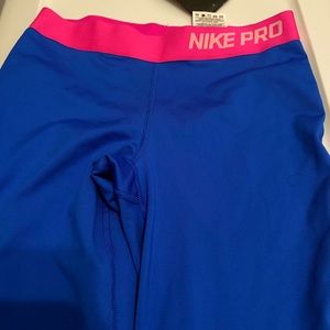 Pink and blue nike leggings
